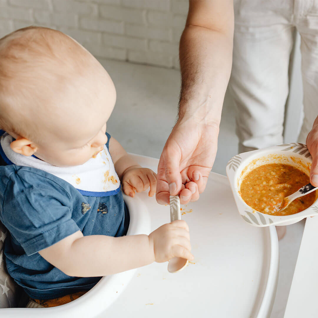 banner baby eating